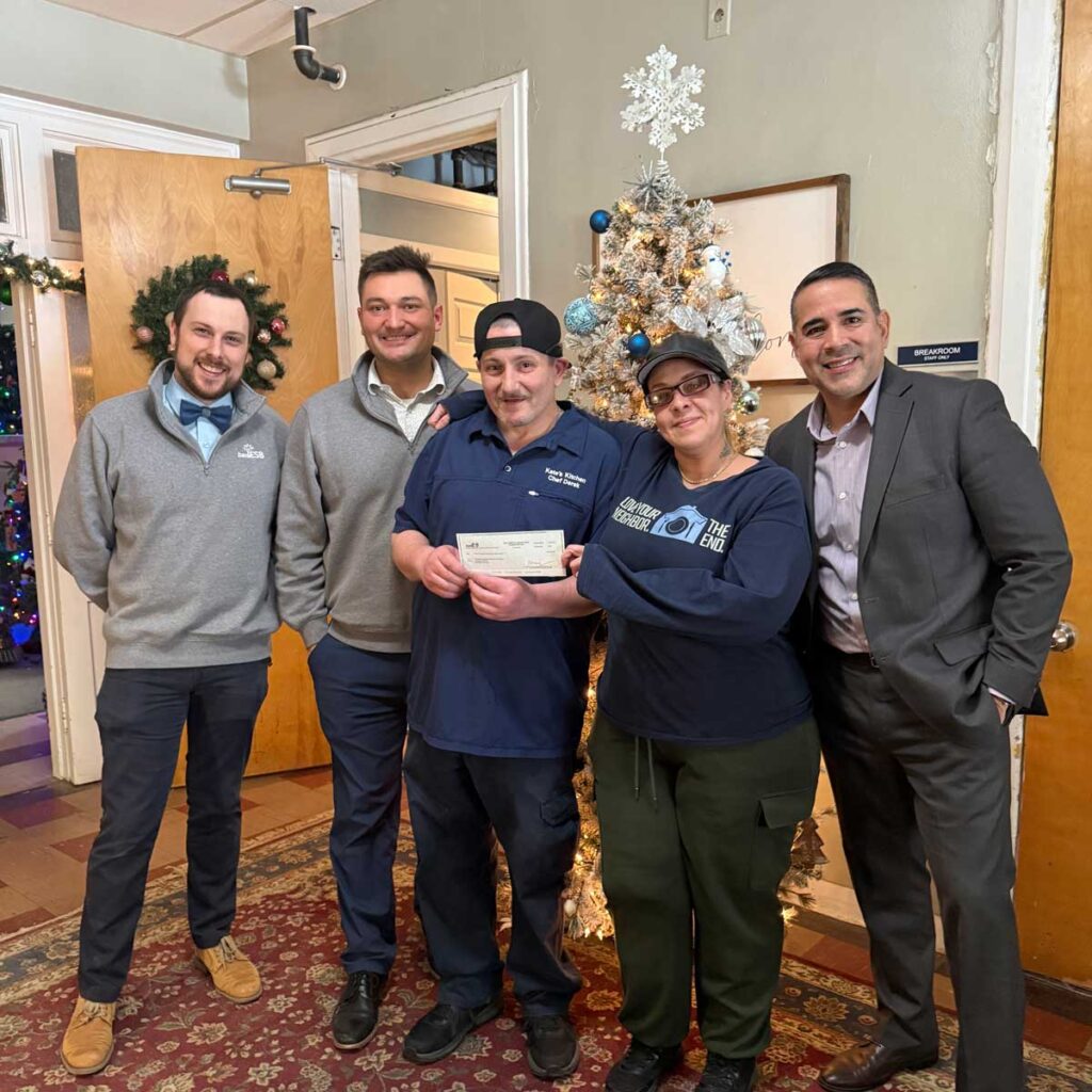 bankESB donates $3025 to Kate’s Kitchen. Pictured from left to right: Trevor McCarthy, Asst. Branch Manager Daniel F. O’Sullivan, Branch Manager Derek Cyr, Kate’s Kitchen Chef Jasmine Colon, Kate’s Kitchen Manager Pedro Rodriguez, PMN Executive Director