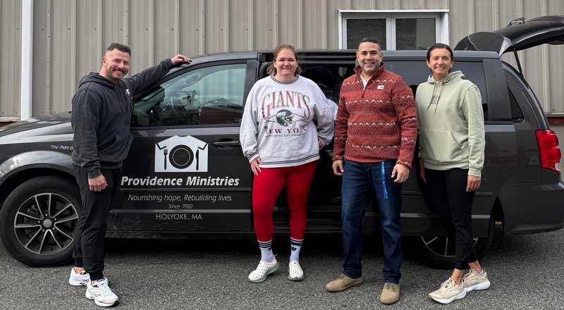 Clothing donations to Providence Ministries as a result of the "Reps for a Reason Challenge" between Train for Life Gym and TF Performance Gym. Pictured left to right is Train for Life Owner Drew McConaha, Dnaielle Hamel Providence Ministries Board Member, Pedro Rodriguez, Providence Ministries Executive Director & Brenda McGiverin, Providence Ministries Board President.