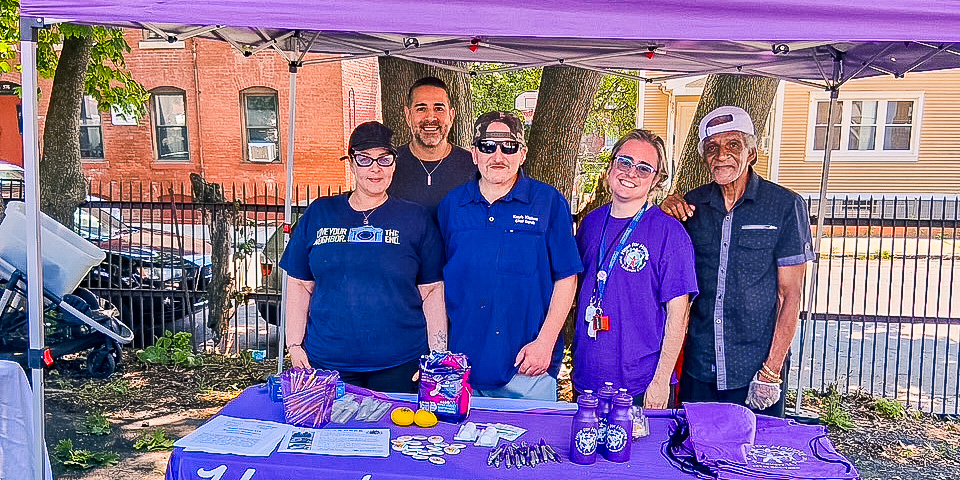 Hope for Holyoke representatives educate the public on peer recovery support services outside Kate's Kitchen, with Providence Ministries team members.